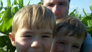 David and kids with corn